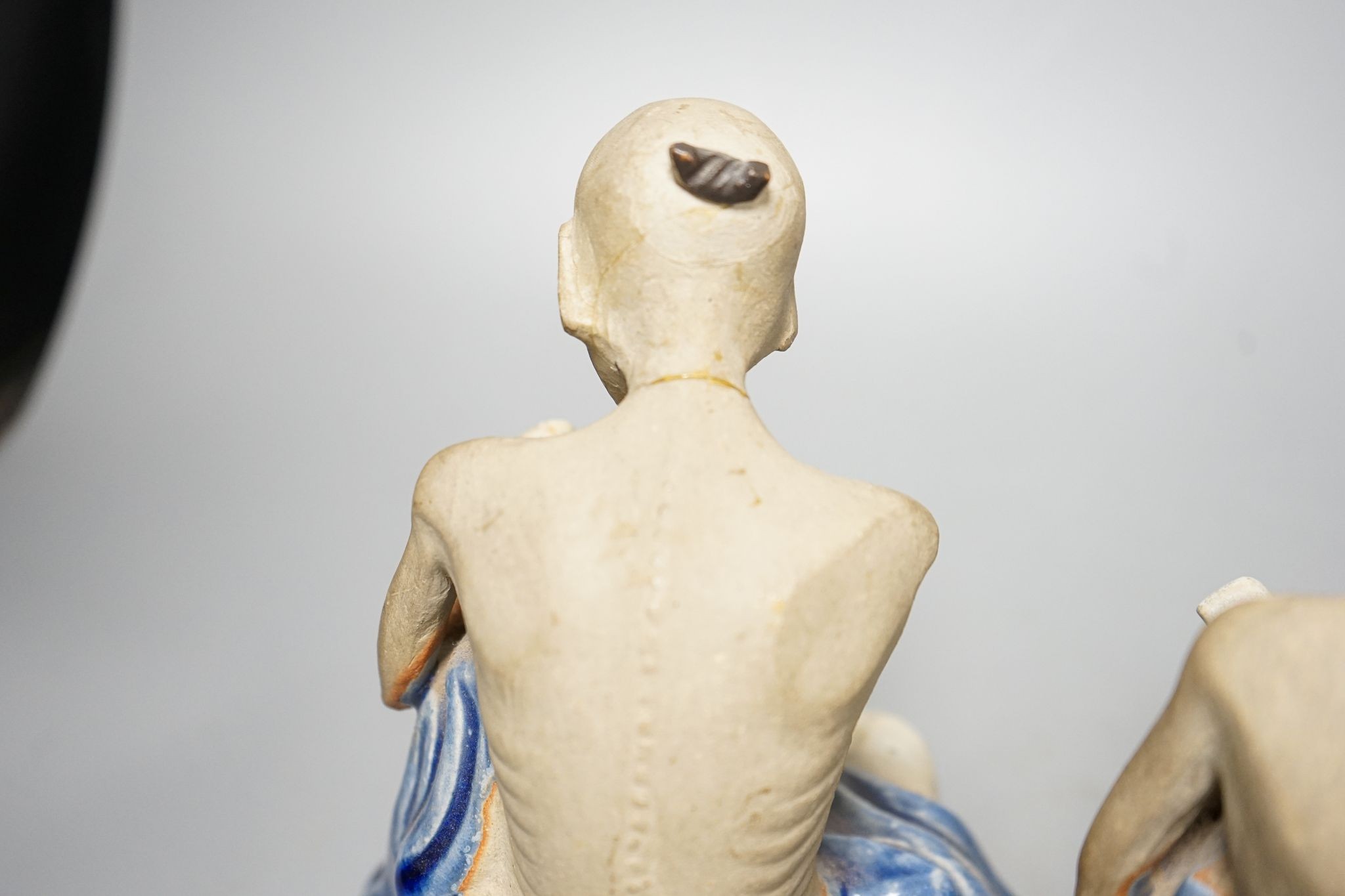 A set of three Shiwan pottery figures of Inohan, 17cm